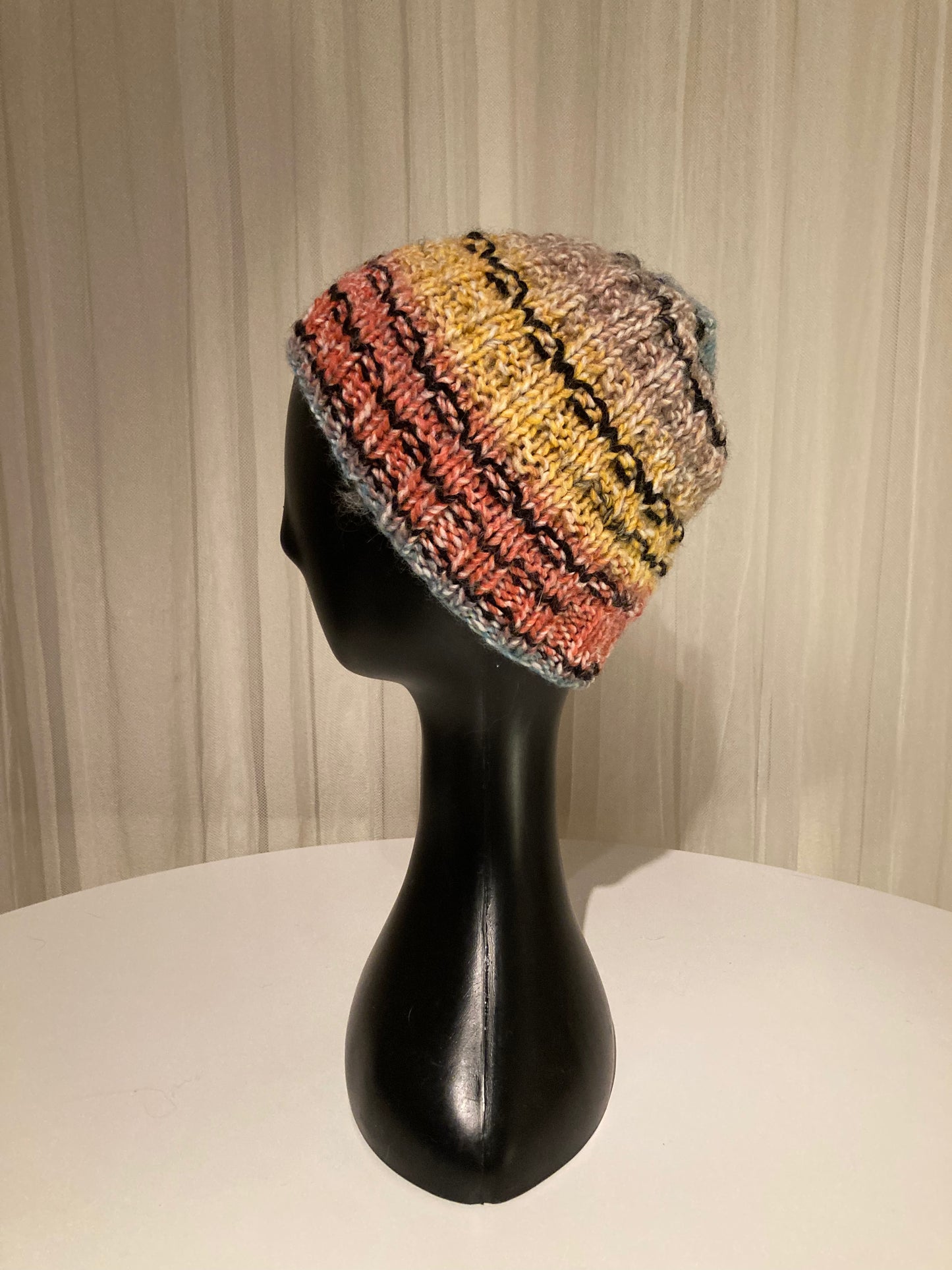 Handknitted Beanie with Retro Vibes Red Blue Yellow Stripes