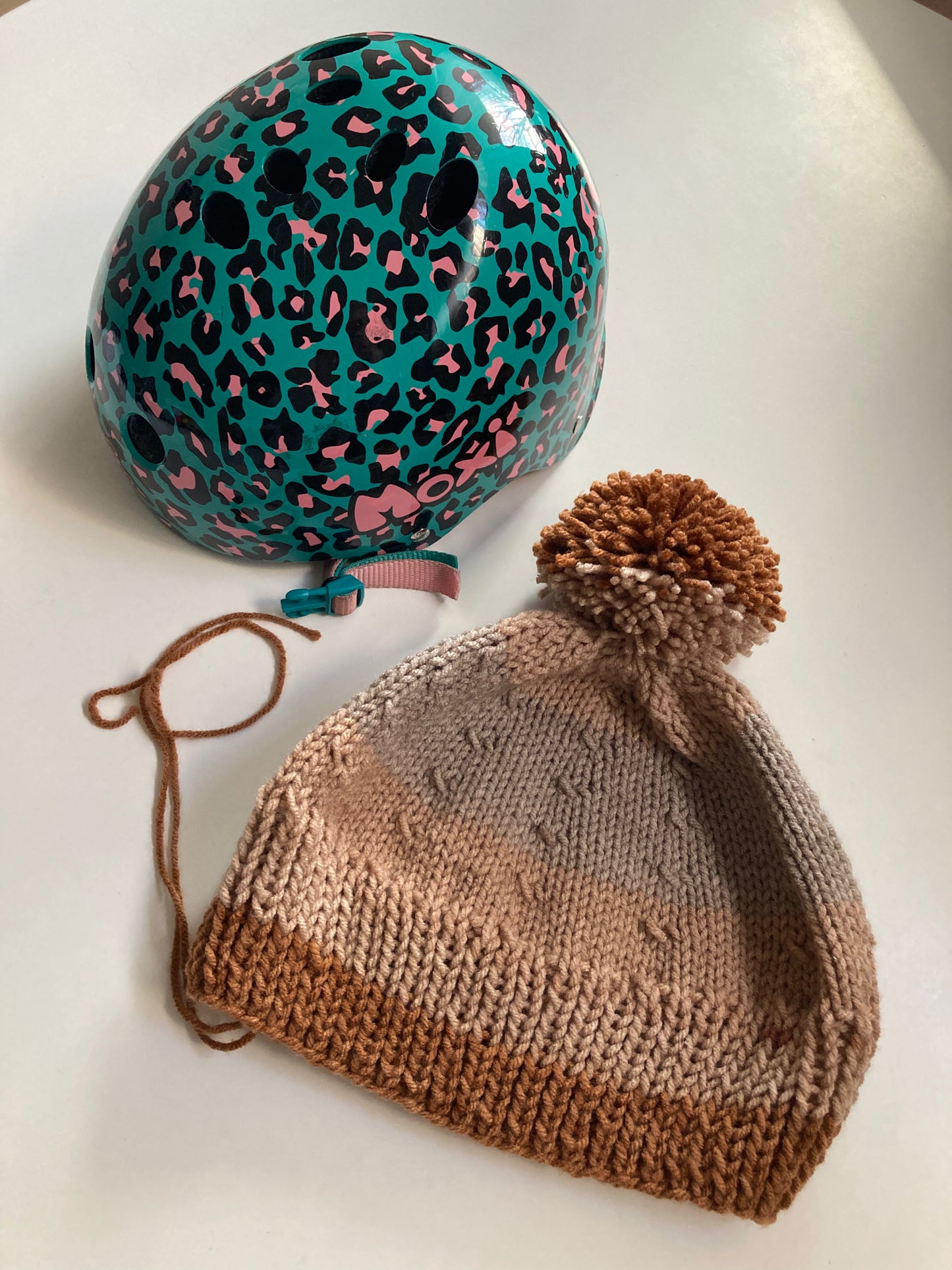 Handknitted Helmet Beanie with Extra Large Pom Pom in Coastal Tans and Gray