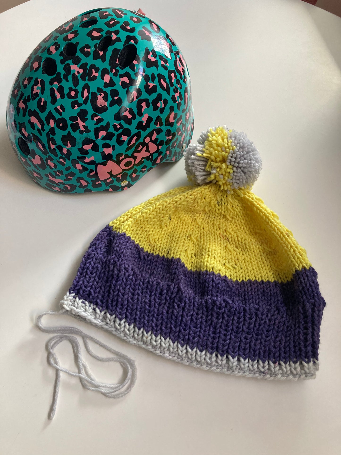 Handknitted Helmet Beanie with Extra Large Pom Pom in Indigo, Yellow and Gray