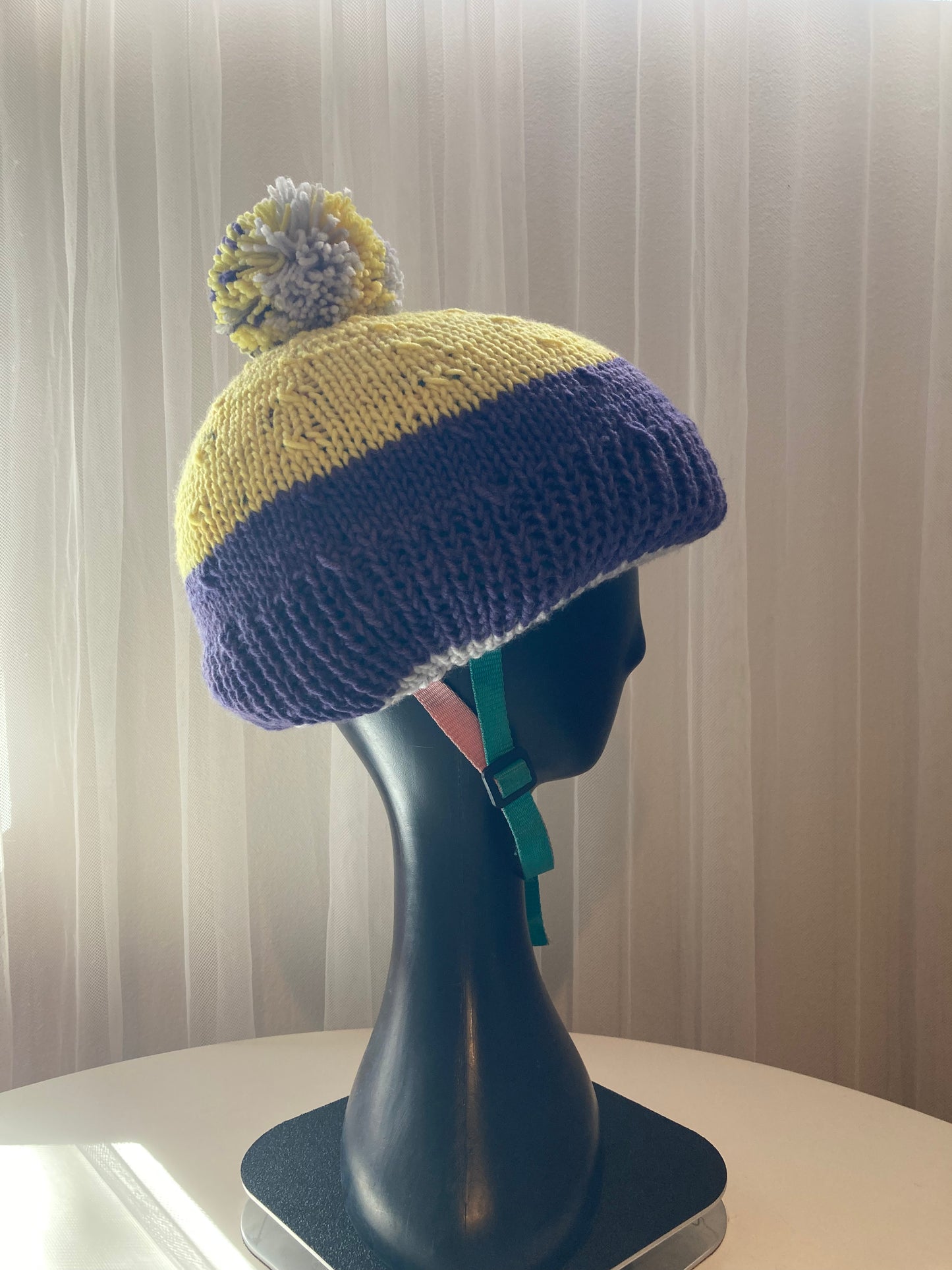 Handknitted Helmet Beanie with Extra Large Pom Pom in Indigo, Yellow and Gray