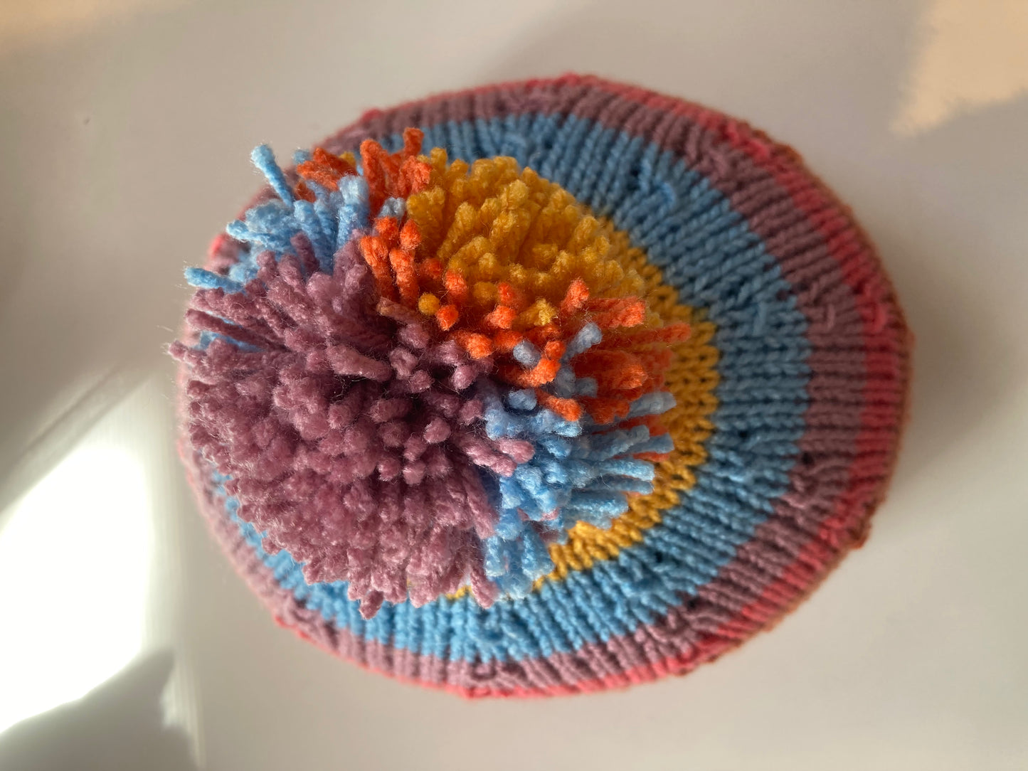 Handknitted Helmet Beanie with Extra Large Pom Pom in Rainbow Stripes #2