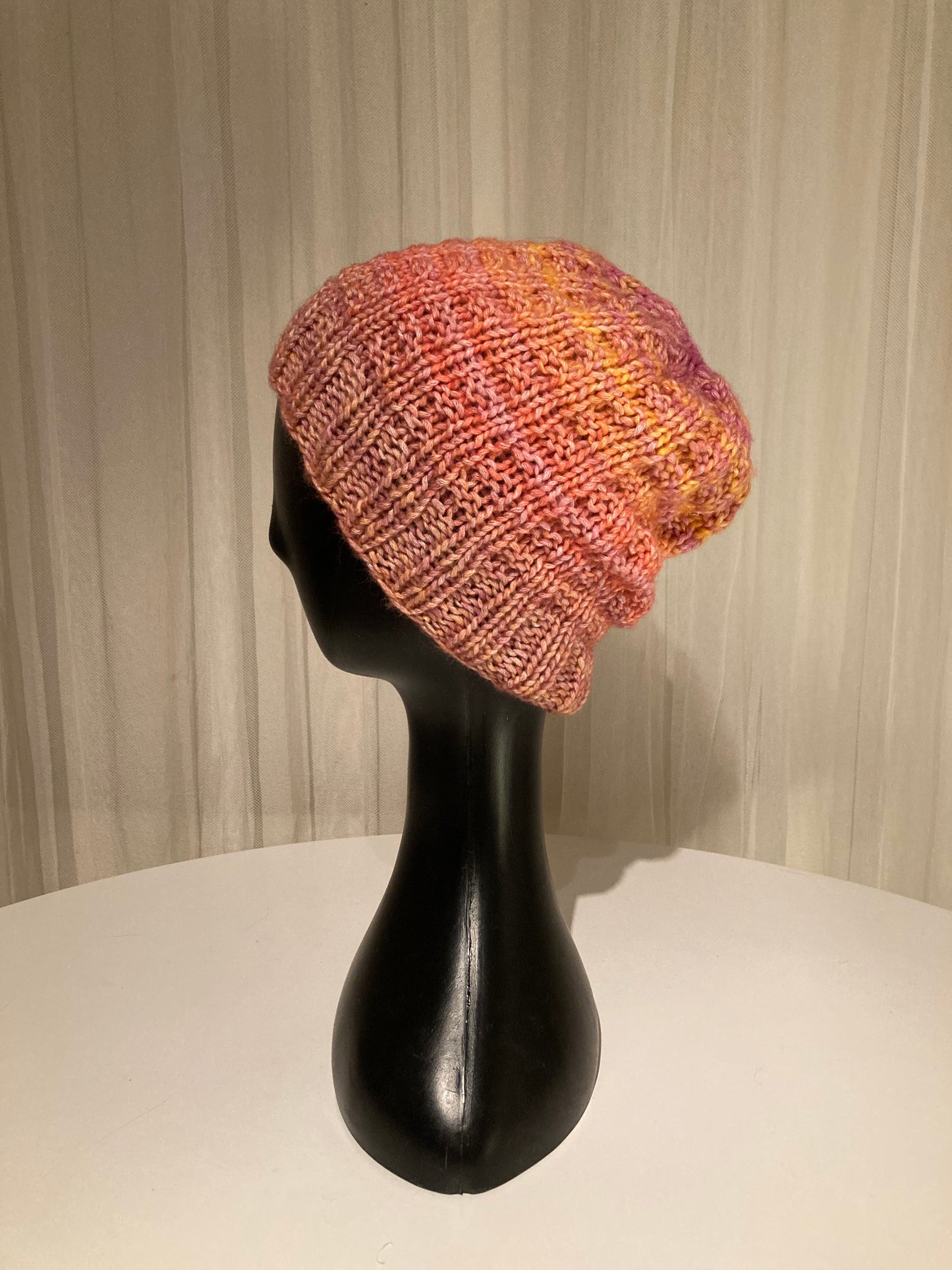 Handknitted Beanie in Bright Warm Dappled Gold, Pink and Purple Tones