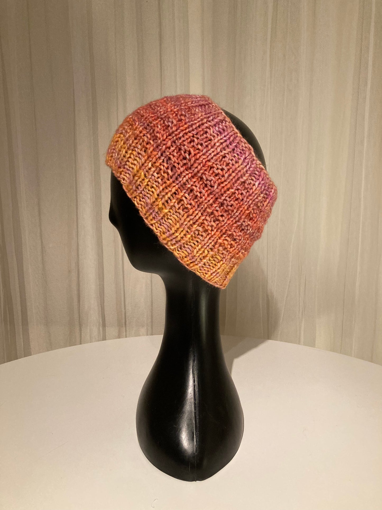 Handknitted Headband in Bright Warm Dappled Gold, Pink and Purple Tones