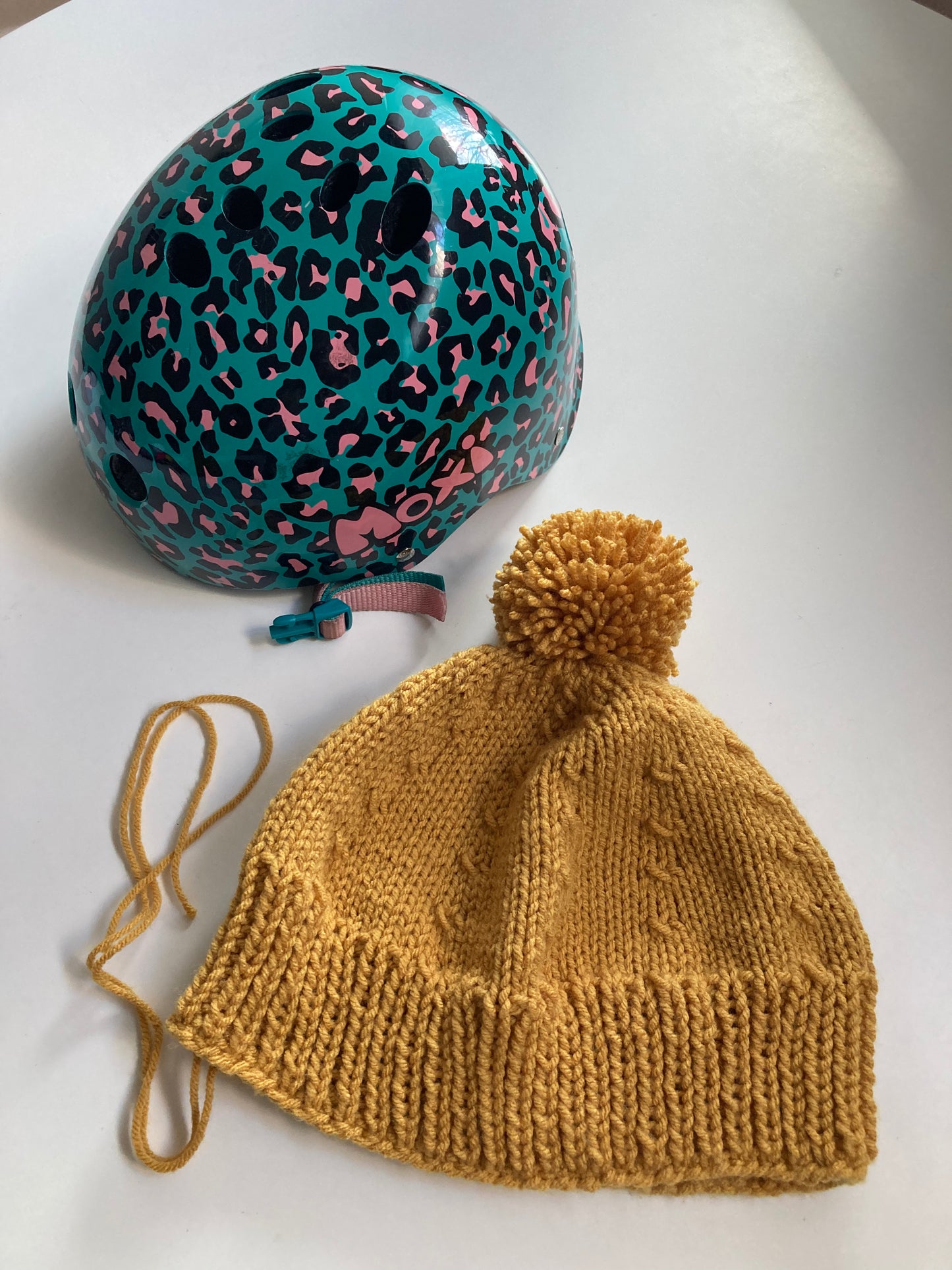 Handknitted Helmet Beanie with Extra Large Pom Pom in Mustard Gold